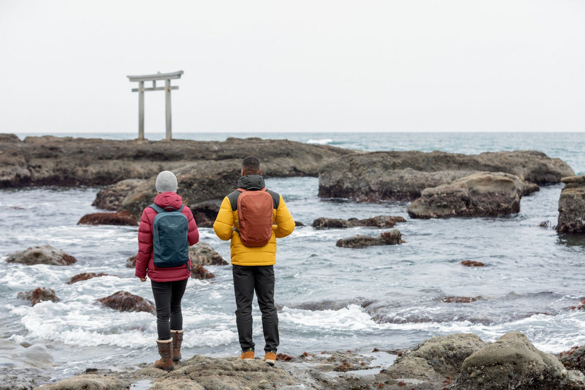 Two people wearing Kathmandu Puffer Jackets
